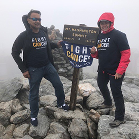 Nayyar Syed, M.D. (left) and Dana Rosencranz, Ph.D., DABR (right) as they reached the summit of Mount Washington, helping raise nearly $60,000 for research.