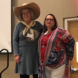 Texas Oncology–Fort Worth Cancer Center’s Beth Cauley, BSN, RN, OCN. (left), with Peggy Bull-Sanchez (right), president of the Fort Worth chapter of the Oncology Nursing Society, which honored  Cauley with the chapter’s Oncology Nurse of the Year Award.