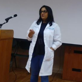 Dr. Sangeetha Kolluri speaks to attendees at a workshop on the importance of breast cancer awareness and genetic testing in San Antonio.